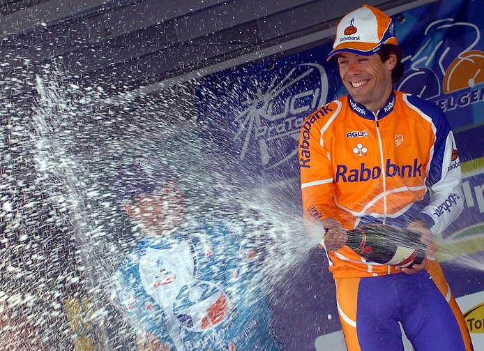 2008 Gent-Wevelgem winner Oscar Freire sprays champagne on the podium